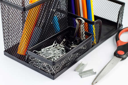 Paper clips in a black metal box.の写真素材