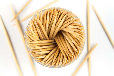 Wooden toothpicks isolated on a white backgroundの写真素材