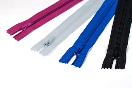 Colorful zipper collection isolated over whiteの写真素材