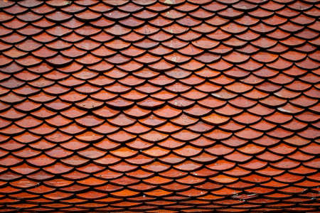 Tile roofs of the old church temple. In Thailand.の写真素材