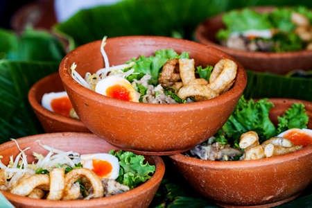 Dried noodles in a overlapping clay bowlの写真素材