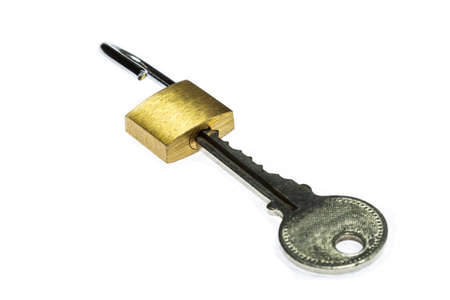 Small padlock but the bigger key on white background