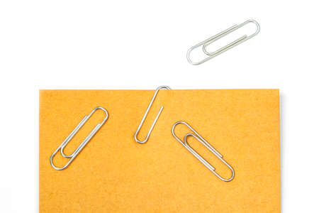 Blank label with clip on white backgroundの写真素材