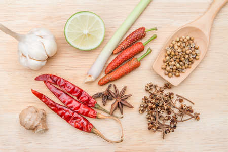 spices and various herb on wood cutting boardsの写真素材