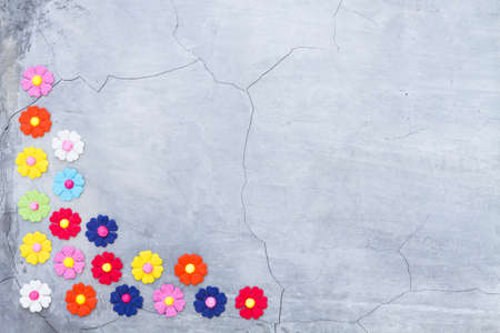 frame of paper flower on cement wall backgroundの写真素材