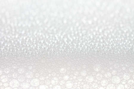 many small air bubbles in clear waterの写真素材