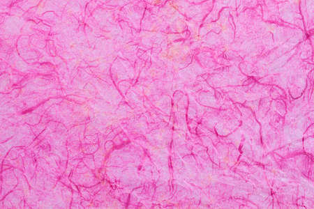 texture of pink mulberry paper. paper backgroundの写真素材