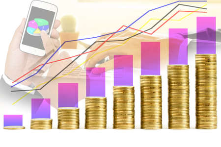 graph and rows of coins on business hand background for finance and business concept