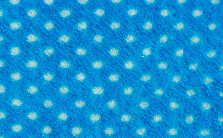 Texture of blue cotton fabric with white pointの写真素材