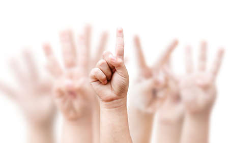 shows the number one on blurred child hand background . leader conceptの写真素材