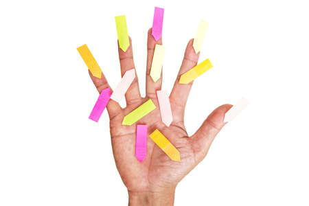 Hand with paper note isolated on white background
