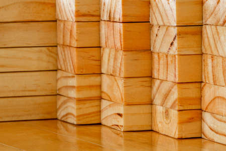 Stack of pine wood planks, lumber backgroundの写真素材