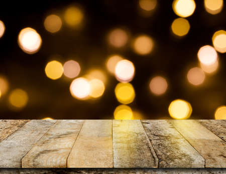 Empty wooden shelf on light bokeh background, for product display montage