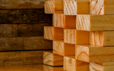 Stack of pine wood planks, lumber backgroundの写真素材