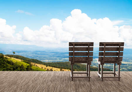 Empty old wooden chair on view of cloud and mountain background, 3d renderの写真素材