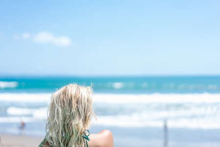 beautiful young sexy woman girl at sea sunbathingの写真素材