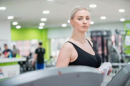 Beautiful woman in the gym exercise yoga fitnessの写真素材
