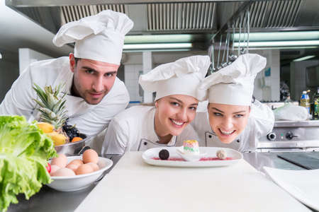 Chef Cooking, Cutting and preparing next plateの写真素材