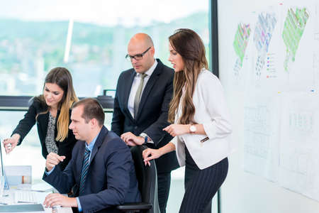 startup business people group working as team to find solution to problemの写真素材