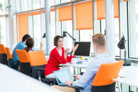 startup business, young creative people group brainstorming on meeting at office interior and using...