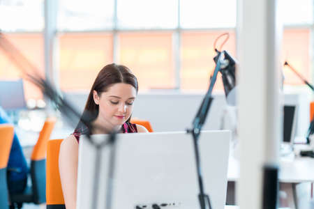 startup business, software developer working on computer at modern officeの写真素材