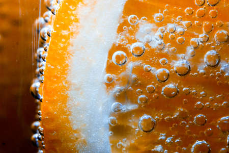 Sparkling fruit in fizzy bubbling water, great for backgrounds and health material.の写真素材