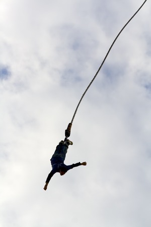 Bungee Jumper with just sky as background.の写真素材