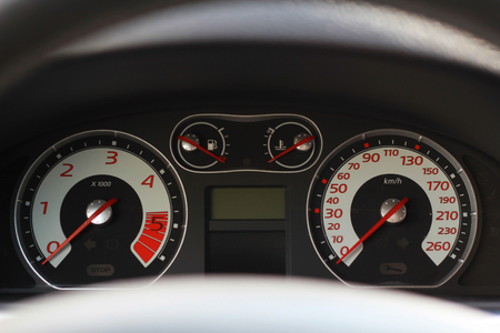Car interior dashboard details with indication lamps. Car detailing. Car instrument panel.の写真素材