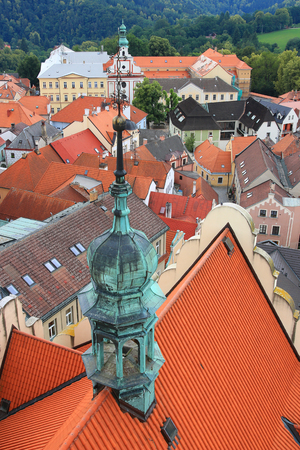 Orange roof top and view from the church tower in Tabor, Czech republicの写真素材