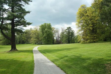 Stone pathway in a garden park, spring seasonの写真素材