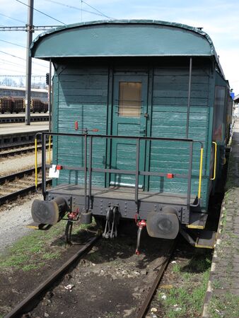 Old Abandoned Wooden Train Wagon, green colouredの写真素材