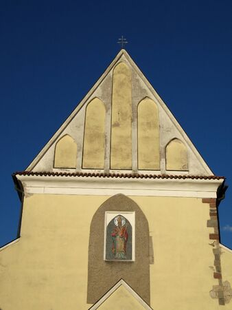 Church and bell tower in old town Benesovの写真素材