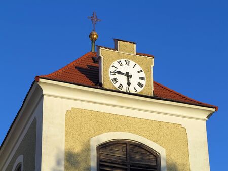 The top of bell tower in old town Benesovの写真素材