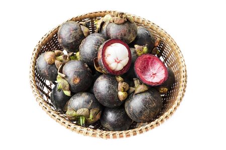 Mangosteen in basketの写真素材