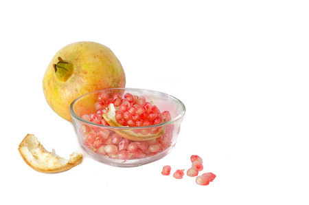 yellow pomegranate on white background with clipping path
