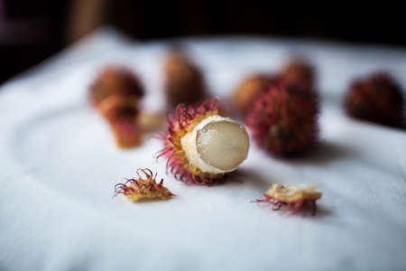 rambutan sweet delicious fruit isolated on a white cloth backgroundの写真素材