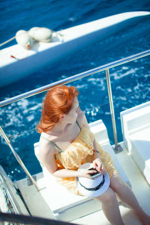 the woman on the yacht on background of oceanの写真素材