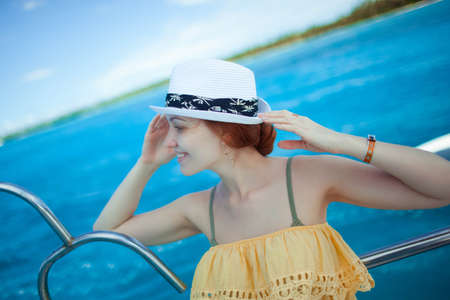 the woman on the yacht on background of oceanの写真素材