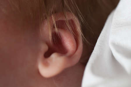 Ear toddler Caucasian closeup.の写真素材