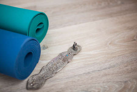 colorful yoga mats are on the floorの写真素材