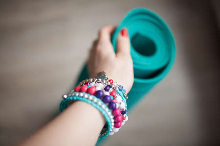 colorful yoga mats are on the floorの写真素材