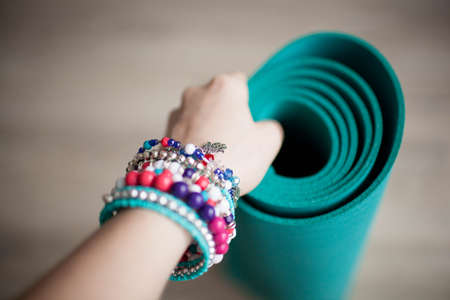 colorful yoga mats are on the floor