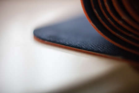 a rolled up yoga Matの写真素材