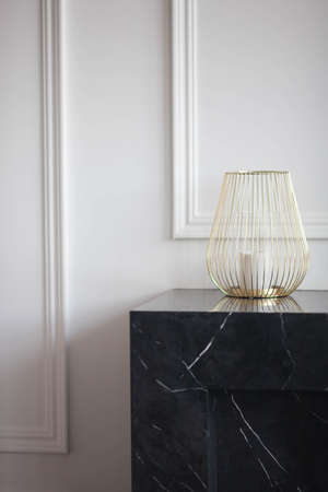 The vase stands on a marble fireplaceの写真素材