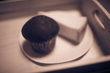 chocolate cake on a wooden tray.の写真素材