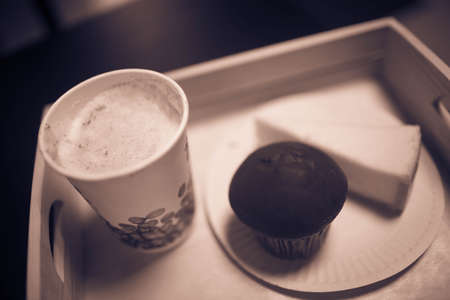 chocolate cake on a wooden tray.の写真素材