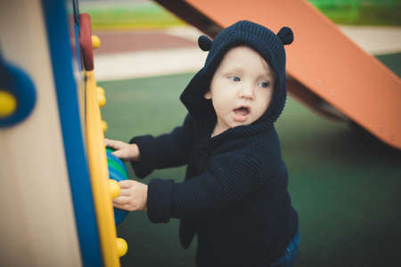 Little Boy In A Playground