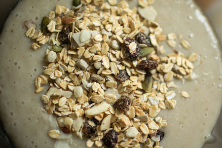 Oatmeal and oatmeal in a plate on the table. Close up.の写真素材