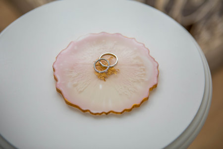 Wedding rings on a tray in the wedding palace.の写真素材