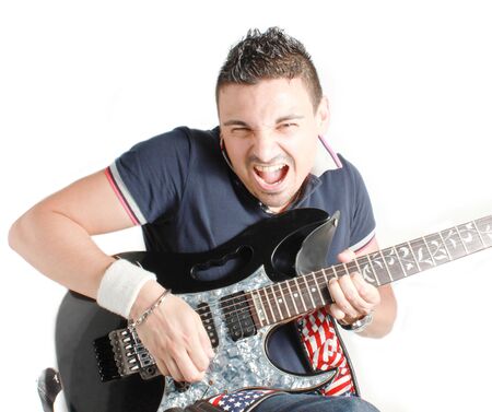 Guitarist boy on a white background